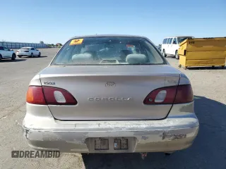 1998 Toyota Corolla VE with VIN 1NXBR12E3WZ093073, listed as a Copart auction lot 58270705 with 303,875 mi miles and Salvage title. Bid and sale history available at DreamBid. Image 6.