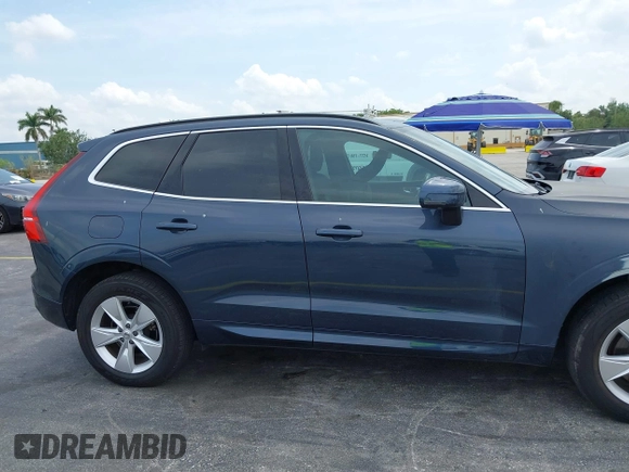 2022 Volvo XC60 Momentum z VIN YV4L12RKXN1052826, wystawiony jako IAAI lot #41869228 z przebiegiem 30 044 mil mil oraz . Historia ofert i sprzedaży dostępna na DreamBid. Obrazek 14.