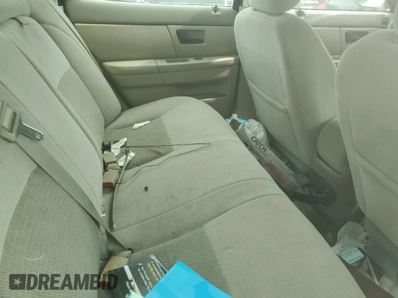 2005 Ford Taurus SE with VIN 1FAFP53U75A125148, listed as a Copart auction lot 49606165 with 216,300 mi miles and Salvage title. Bid and sale history available at DreamBid. Image 10.