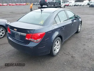 2013 Chevrolet Cruze 1LT with VIN 1G1PC5SB5D7312533, listed as a IAAI auction lot 41875213 with 94,953 mi miles and . Bid and sale history available at DreamBid. Image 4.