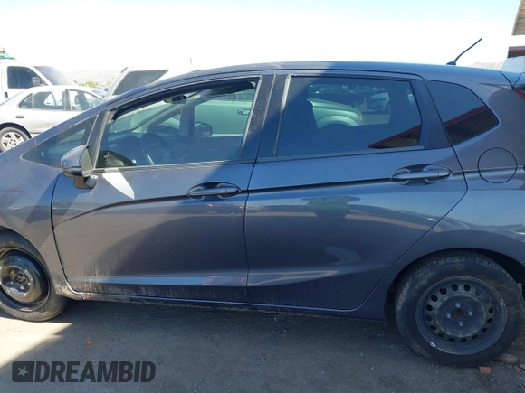 2018 Honda Fit LX with VIN 3HGGK5H51JM731851, listed as a IAAI auction lot 42570144 with 69,236 mi miles and . Bid and sale history available at DreamBid. Image 14.