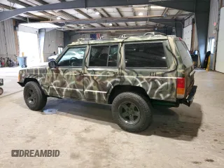 1998 Jeep Cherokee Sport with VIN 1J4FJ68S7WL269467, listed as a Copart auction lot 58664135 with 187,741 mi miles and Clean title. Bid and sale history available at DreamBid. Image 2.