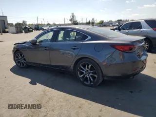 2017 Mazda 6 Grand Touring with VIN JM1GL1W5XH1133708, listed as a Copart auction lot 49009255 with 115,259 mi miles and Salvage Title. Bid and sale history available at carsss.com. Image 2.