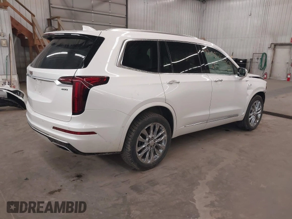 2022 Cadillac XT6 Premium Luxury with VIN 1GYKPDRS3NZ131095, listed as a IAAI auction lot 42087620 with 36,740 mi miles and . Bid and sale history available at DreamBid. Image 4.