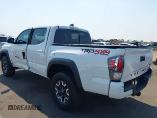 2023 Toyota Tacoma SR with VIN 3TMCZ5AN7PM630874, listed as a IAAI auction lot 40298041 with 8,635 mi miles and . Bid and sale history available at DreamBid. Image 3.
