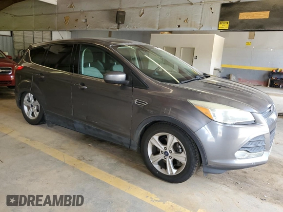 2014 Ford Escape SE with VIN 1FMCU0GX4EUA81634, listed as a Copart auction lot 48290955 with 107,286 mi miles and Salvage Title. Bid and sale history available at DreamBid. Image 4.