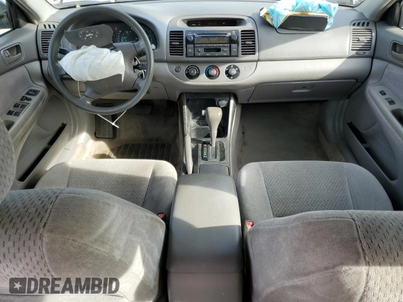 2002 Toyota Camry XLE z VIN 4T1BF32K02U034535, wystawiony jako Copart lot #53894995 z przebiegiem 253 037 mil mil oraz Szkoda całkowita • Salvage title. Historia ofert i sprzedaży dostępna na DreamBid. Obrazek 8.