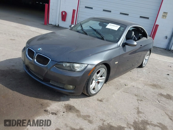 2007 BMW 3 Series 335i with VIN WBAWL73587PX47653, listed as a IAAI auction lot 41428352 with 225,457 mi miles. Bid and sale history available at carsss.com. Image 17.