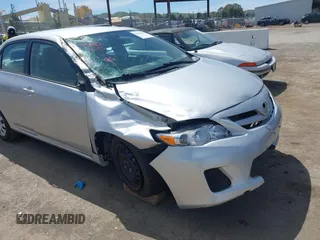 2011 Toyota Corolla L with VIN 2T1BU4EE1BC572731, listed as a IAAI auction lot 42024851 with 153,923 mi miles. Bid and sale history available at carsss.com. Image 13.