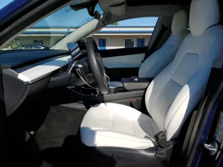2020 Tesla Model Y Long Range with VIN 5YJYGDEE8LF034719, listed as a Copart auction lot 50888365 with 55,307 mi miles and Salvage Title. Bid and sale history available at DreamBid. Image 7.