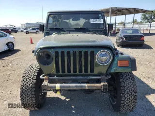 1997 Jeep Wrangler SE with VIN 1J4FY29P0VP521856, listed as a Copart auction lot 53396485 with 173,138 mi miles and Salvage Title. Bid and sale history available at carsss.com. Image 5.