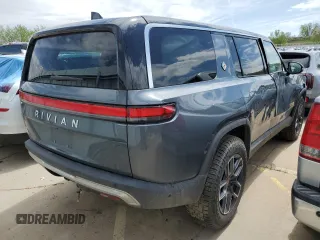 2023 Rivian R1S Adventure z VIN 7PDSGABA3PN018823, wystawiony jako Copart lot #53184595 z przebiegiem 36 677 mil mil oraz Szkoda całkowita • Salvage title. Historia ofert i sprzedaży dostępna na DreamBid. Obrazek 3.