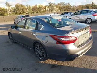 2018 Nissan Altima 2.5 SV with VIN 1N4AL3AP0JC136126, listed as a IAAI auction lot 41431759 with 170,825 mi miles. Bid and sale history available at carsss.com. Image 3.