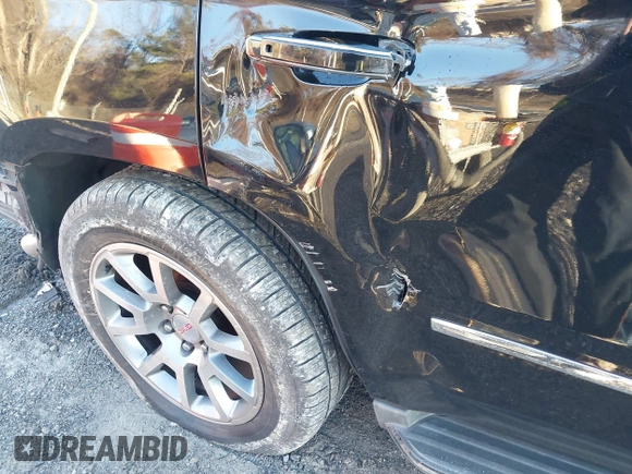 2016 GMC Yukon Denali with VIN 1GKS2CKJ2GR412201, listed as a IAAI auction lot 41185716 with 124,421 mi miles. Bid and sale history available at carsss.com. Image 19.