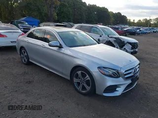 2018 Mercedes-Benz E-Class E 300 with VIN WDDZF4KB0JA293475, listed as a IAAI auction lot 40535870 with 99,229 mi miles. Bid and sale history available at carsss.com. Image 1.