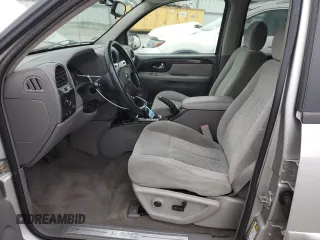 2005 GMC Envoy SLT with VIN 1GKDS13S452258553, listed as a Copart auction lot 82888944 with 174,546 mi miles and Salvage Title. Bid and sale history available at carsss.com. Image 7.