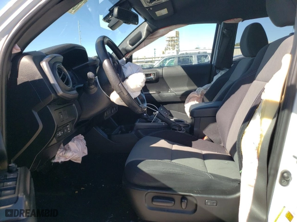2021 Toyota Tacoma 4WD SR with VIN 5TFCZ5AN7MX264601, listed as a Copart auction lot 81404324 with 51,732 mi miles and Salvage Title. Bid and sale history available at carsss.com. Image 7.