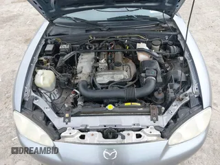 2002 Mazda MX-5 Miata Cloth z VIN JM1NB353X20227591, wystawiony jako IAAI lot #42066430 z przebiegiem 79 585 mil mil oraz . Historia ofert i sprzedaży dostępna na DreamBid. Obrazek 10.