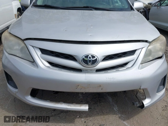 2011 Toyota Corolla L with VIN 2T1BU4EE8BC687021, listed as a IAAI auction lot 41934778 with 176,587 mi miles. Bid and sale history available at carsss.com. Image 12.