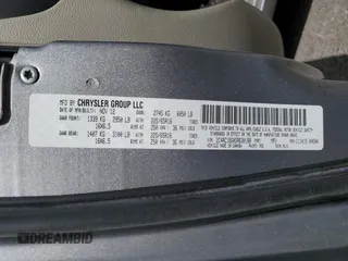2013 Chrysler Town & Country Touring z VIN 2C4RC1BG0DR630188, wystawiony jako Copart lot #53320815 z przebiegiem 115 026 mil mil oraz Szkoda całkowita • Salvage title. Historia ofert i sprzedaży dostępna na DreamBid. Obrazek 13.