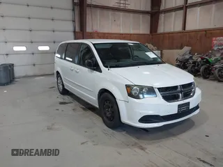 2014 Dodge Grand Caravan SE with VIN 2C4RDGBG2ER137873, listed as a IAAI auction lot 42143034 with 184,401 mi miles and . Bid and sale history available at DreamBid. Image 1.
