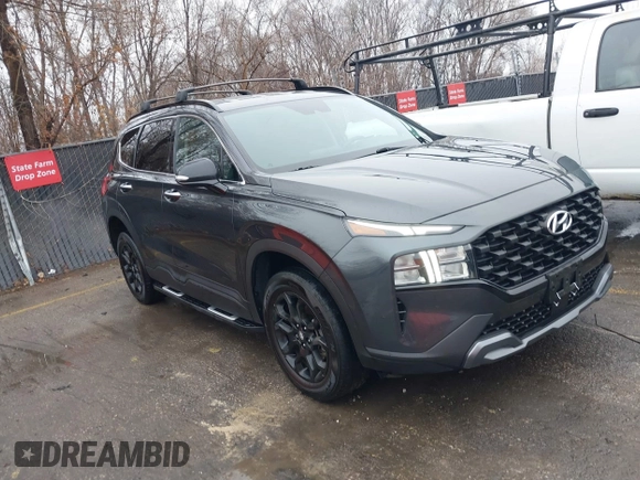 2022 Hyundai Santa Fe XRT with VIN 5NMS6DAJ4NH409308, listed as a IAAI auction lot 41187786 with 24,951 mi miles. Bid and sale history available at carsss.com. Image 1.