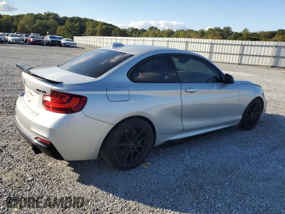 2015 BMW 2 Series M235i with VIN WBA1J7C57FV254038, listed as a Copart auction lot 73657294 with 117,883 mi miles and Salvage Title. Bid and sale history available at carsss.com. Image 3.