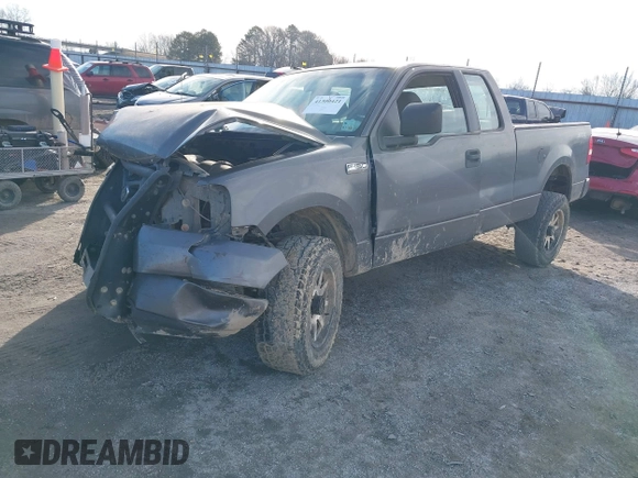 2005 Ford F-150 STX with VIN 1FTRX14W05FB27858, listed as a IAAI auction lot 41300421 with 225,035 mi miles. Bid and sale history available at carsss.com. Image 2.