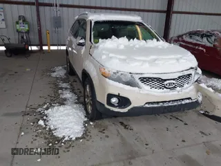 2011 Kia Sorento EX with VIN 5XYKU4A29BG040661, listed as a IAAI auction lot 41542762 with 185,108 mi miles. Bid and sale history available at carsss.com. Image 1.