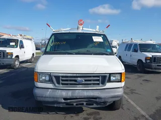 2006 Ford Econoline Cargo z VIN 1FTNE24L56DA64432, wystawiony jako IAAI lot #41888024 z przebiegiem 245 481 mil mil oraz . Historia ofert i sprzedaży dostępna na DreamBid. Obrazek 13.