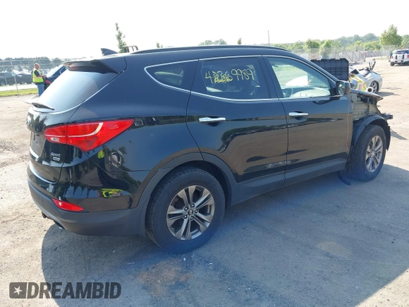 2014 Hyundai Santa Fe with VIN 5XYZUDLB9EG187420, listed as a IAAI auction lot 42369989 with 181,713 mi miles and . Bid and sale history available at DreamBid. Image 4.