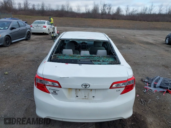 2014 Toyota Camry L with VIN 4T4BF1FKXER374901, listed as a IAAI auction lot 41861839 with 130,990 mi miles and . Bid and sale history available at DreamBid. Image 6.