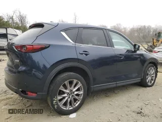 2019 Mazda CX-5 Grand Touring with VIN JM3KFBDM8K0609976, listed as a Copart auction lot 48056305 with 81,494 mi miles and Salvage Title. Bid and sale history available at carsss.com. Image 3.