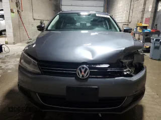 2013 Volkswagen Jetta SE z VIN 3VWDX7AJ7DM450368, wystawiony jako Copart lot #87016754 z przebiegiem 126 156 mil mil oraz Czysty tytuł • Clean title. Historia ofert i sprzedaży dostępna na DreamBid. Obrazek 5.