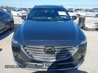 2020 Mazda CX-9 Grand Touring with VIN JM3TCADY1L0417651, listed as a IAAI auction lot 42334867 with 105,236 mi miles and . Bid and sale history available at DreamBid. Image 12.
