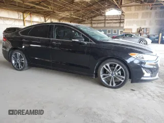 2019 Ford Fusion Titanium with VIN 3FA6P0D90KR116340, listed as a Copart auction lot 60240135 with 190,838 mi miles and Clean title. Bid and sale history available at DreamBid. Image 4.