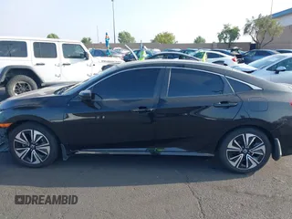 2016 Honda Civic EX-L with VIN 2HGFC1F79GH659164, listed as a IAAI auction lot 42455097 with 166,157 mi miles and . Bid and sale history available at DreamBid. Image 14.