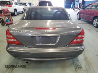 2003 Mercedes-Benz SLK 320 with VIN WDBKK65F83F280656, listed as a Copart auction lot 79158954 with 99,413 mi miles and Salvage title. Bid and sale history available at DreamBid. Image 6.