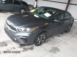 2021 Kia Forte LXS with VIN 3KPF24AD7ME329787, listed as a IAAI auction lot 41976938 with 134,385 mi miles and . Bid and sale history available at DreamBid. Image 2.