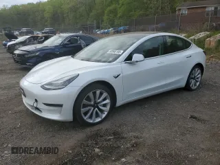 2018 Tesla Model 3 Long Range Battery with VIN 5YJ3E1EAXJF165000, listed as a Copart auction lot 53806195 with 140,448 mi miles and Clean Title. Bid and sale history available at DreamBid. Image 1.