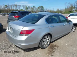 2009 Honda Accord EX-L with VIN 1HGCP36809A043415, listed as a IAAI auction lot 42143828 with 144,436 mi miles and . Bid and sale history available at DreamBid. Image 4.