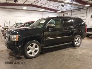 2012 Chevrolet Tahoe LTZ with VIN 1GNSKCE02CR297261, listed as a IAAI auction lot 40255137 with 283,110 mi miles and . Bid and sale history available at DreamBid. Image 15.