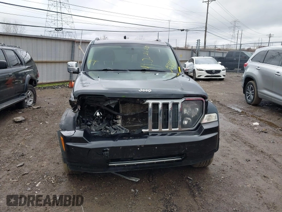 2011 Jeep Liberty Sport with VIN 1J4PN2GK2BW577724, listed as a IAAI auction lot 41032620 with 147,888 mi miles and . Bid and sale history available at carsss.com. Image 12.