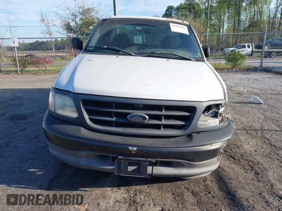 2002 Ford F-150 XL z VIN 1FTRF17L22NB18648, wystawiony jako IAAI lot #41843041 z przebiegiem 90 033 mil mil oraz . Historia ofert i sprzedaży dostępna na DreamBid. Obrazek 13.