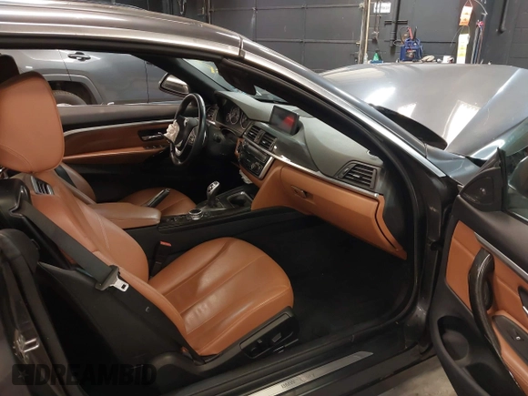 2014 BMW 4 Series 428i xDrive with VIN WBA3T1C59EPS98299, listed as a IAAI auction lot 41741235 with 93,000 mi miles and . Bid and sale history available at carsss.com. Image 5.