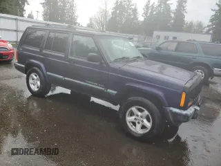 1999 Jeep Cherokee Sport with VIN 1J4FF68S6XL602177, listed as a Copart auction lot 51962355 with 176,386 mi miles and Salvage Title. Bid and sale history available at carsss.com. Image 4.