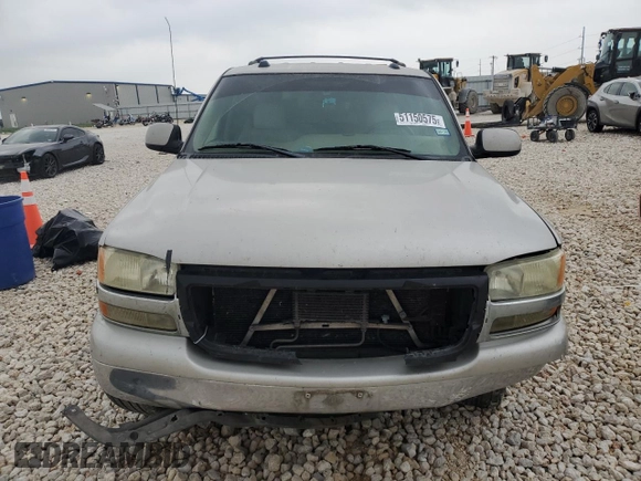 2004 GMC Yukon SLT with VIN 1GKEC13Z34R313210, listed as a Copart auction lot 51150575 with 328,961 mi miles and Salvage Title. Bid and sale history available at carsss.com. Image 5.