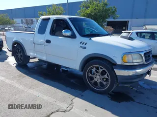 1997 Ford F-150 with VIN 1FTDX1723VKB04987, listed as a IAAI auction lot 41411405 with 234,750 mi miles and . Bid and sale history available at DreamBid. Image 1.