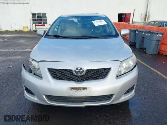 2009 Toyota Corolla with VIN 1NXBU40E39Z131392, listed as a IAAI auction lot 41194018 with 136,031 mi miles. Bid and sale history available at carsss.com. Image 12.