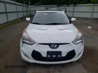 2013 Hyundai Veloster w/Gray Int с VIN KMHTC6AD3DU164555, выставлен на аукционе Copart как лот 54487605 с пробегом 146 134 миль миль и Списание • Salvage title. История ставок и продаж доступна на DreamBid. Изображение 5.